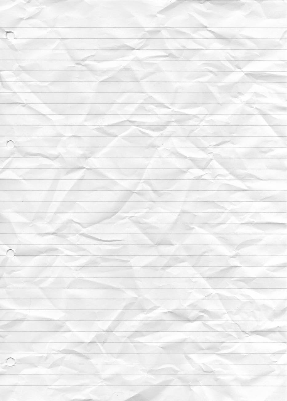 a scrunched lined paper sheet